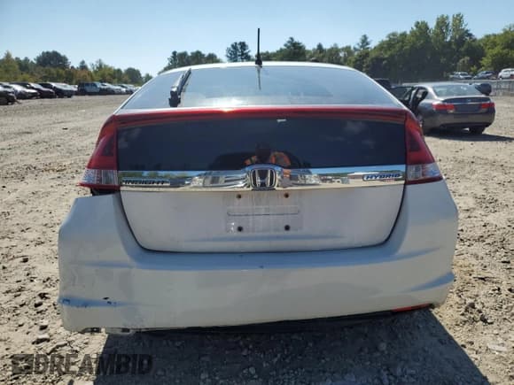 ✅ 2014 Honda Insight LX • VIN: JHMZE2H57ES000818 • Lot: 81487865. Wystawiony na Copart z przebiegiem 125 469 mil. Bezpłatny archiwum sprzedaży aukcyjnych z USA i szczegółowy raport historii pojazdu na DreamBid. Zdjęcie 6.