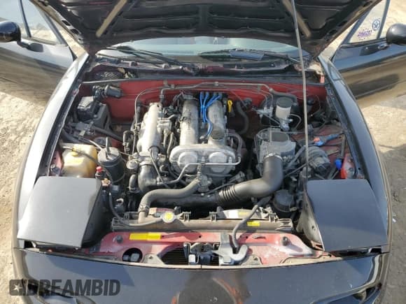 ✅ 1990 Mazda MX-5 Miata Special Edition • VIN: JM1NA3518L0128688 • Lot: 77797504. Wystawiony na Copart z przebiegiem 187 104 mil. Bezpłatny archiwum sprzedaży aukcyjnych z USA i szczegółowy raport historii pojazdu na DreamBid. Zdjęcie 11.