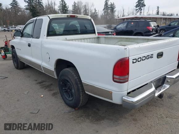 ✅ 1999 Dodge Dakota SLT • VIN: 1B7GL22X4XS105506 • Lot: 41445688. Wystawiony na IAAI z przebiegiem 192 870 mil. Bezpłatny archiwum sprzedaży aukcyjnych z USA i szczegółowy raport historii pojazdu na DreamBid. Zdjęcie 3.