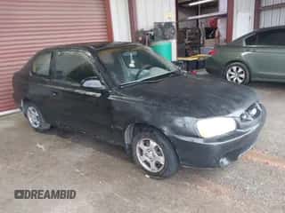 2001 Hyundai Accent GS with VIN KMHCG35C81U090873, listed as a IAAI auction lot 41436739 with 59,359 mi miles and . Bid and sale history available at DreamBid. Image 1.