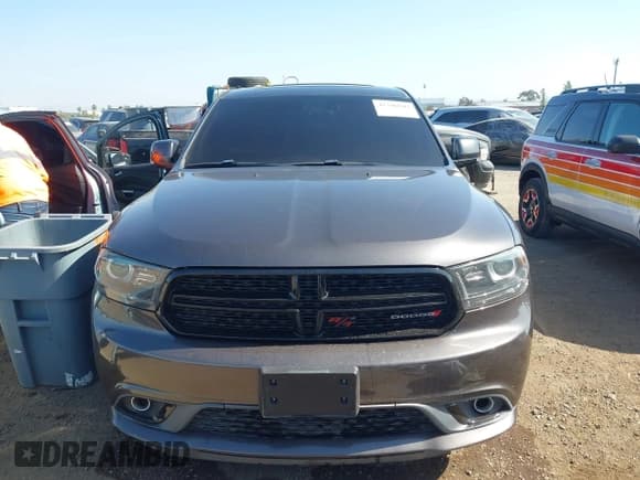 ✅ 2014 Dodge Durango R/T • VIN: 1C4SDJCT5EC591649 • Lot: 42346947. Listed on IAAI with 143,143 mi. Free auction sales archive from the USA and detailed vehicle history report at DreamBid. Image 12.