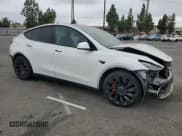 ✅ 2022 Tesla Model Y Performance • VIN: 7SAYGDEF9NF465682 • Lot: 71891945. Listed on Copart with 52,423 mi. Free auction sales archive from the USA and detailed vehicle history report at DreamBid. Image 4.