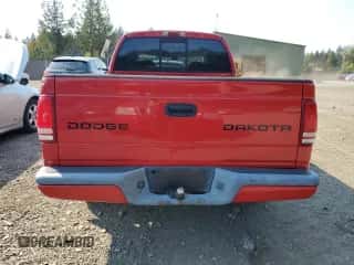 2003 Dodge Dakota Sport z VIN 1D7HL38NX3S350049, wystawiony jako Copart lot #70331774 z przebiegiem 159 215 mil mil oraz Szkoda całkowita • Salvage title. Historia ofert i sprzedaży dostępna na DreamBid. Obrazek 6.