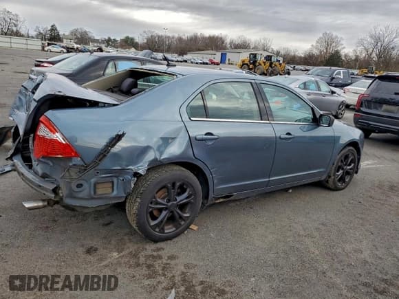 ✅ 2012 Ford Fusion SE • VIN: 3FAHP0HG0CR101758 • Lot: 94079475. Listed on Copart with 219,411 mi. Free auction sales archive from the USA and detailed vehicle history report at DreamBid. Image 3.