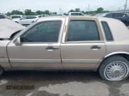 ✅ 1997 Lincoln Town Car Signature • VIN: 1LNLM82W9VY742564 • Lot: 42338729. Listed on IAAI with 206,178 mi. Free auction sales archive from the USA and detailed vehicle history report at DreamBid. Image 14.