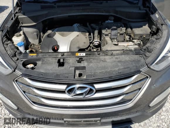 ✅ 2015 Hyundai Santa Fe • VIN: 5XYZW4LAXFG239754 • Lot: 71499665. Listed on Copart with 75,339 mi. Free auction sales archive from the USA and detailed vehicle history report at DreamBid. Image 12.