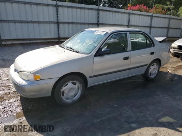 ✅ 2002 Chevrolet Prizm • VIN: 1Y1SK52842Z408689 • Lot: 80474435. Listed on Copart with 297,701 mi. Free auction sales archive from the USA and detailed vehicle history report at DreamBid. Image 1.