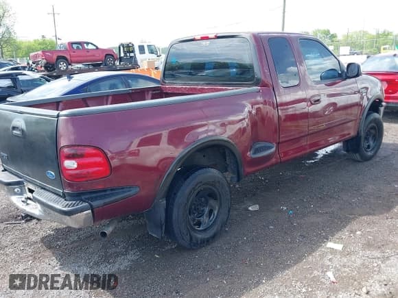 ✅ 1997 Ford F-150 • VIN: 1FTDX0868VKA19221 • Lot: 42094451. Listed on IAAI with 184,742 mi. Free auction sales archive from the USA and detailed vehicle history report at DreamBid. Image 4.