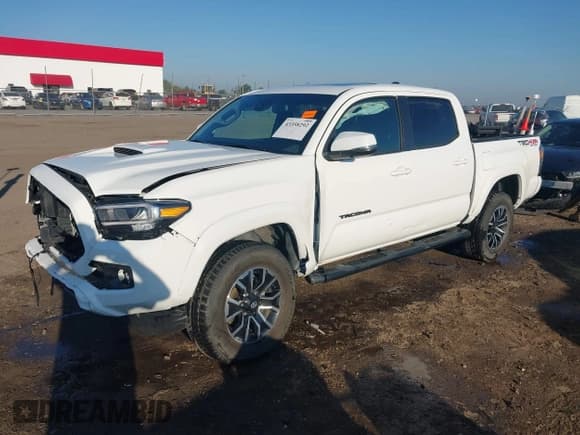 ✅ 2023 Toyota Tacoma SR • VIN: 3TMCZ5AN5PM558010 • Лот: 43358292. Опубликован ранее на IAAI с пробегом 26 117 миль. Бесплатный доступ к архиву аукционных продаж из США и подробный отчёт об истории автомобиля на DreamBid. Изображение 2.