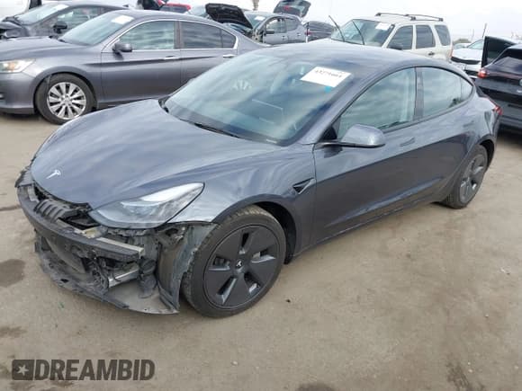 ✅ 2023 Tesla Model 3 • VIN: 5YJ3E1EA0PF644809 • Lot: 43271664. Listed on IAAI with 71,806 mi. Free auction sales archive from the USA and detailed vehicle history report at DreamBid. Image 2.