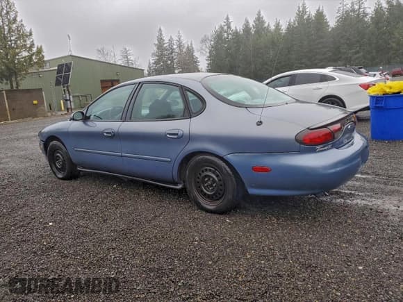 ✅ 1999 Ford Taurus SE • VIN: 1FAFP53U6XG135640 • Lot: 95623995. Listed on Copart with 166,389 mi. Free auction sales archive from the USA and detailed vehicle history report at DreamBid. Image 2.