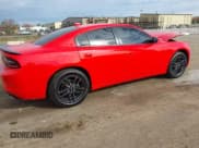 ✅ 2019 Dodge Charger SXT • VIN: 2C3CDXJG2KH555413 • Lot: 43464035. Listed on IAAI with 52,579 mi. Free auction sales archive from the USA and detailed vehicle history report at DreamBid. Image 4.