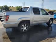 ✅ 2014 Honda Ridgeline SE • VIN: 5FPYK1F61EB012477 • Lot: 65182815. Listed on Copart with 168,666 mi. Free auction sales archive from the USA and detailed vehicle history report at DreamBid. Image 3.