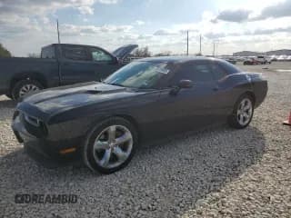 ✅ 2012 Dodge Challenger SXT • VIN: 2C3CDYAG8CH162071 • Lot: 43978905. Wystawiony na Copart z przebiegiem 194 590 mil. Bezpłatny archiwum sprzedaży aukcyjnych z USA i szczegółowy raport historii pojazdu na DreamBid. Zdjęcie 1.
