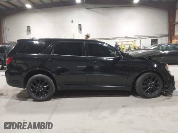 2017 Dodge Durango R/T with VIN 1C4SDJCT9HC945581, listed as a IAAI auction lot 43420044 with 143,365 mi miles and . Bid and sale history available at DreamBid. Image 13.