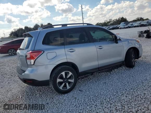 2017 Subaru Forester Limited with VIN JF2SJALC7HH442418, listed as a Copart auction lot 82584035 with 57,114 mi miles and Salvage title. Bid and sale history available at DreamBid. Image 3.