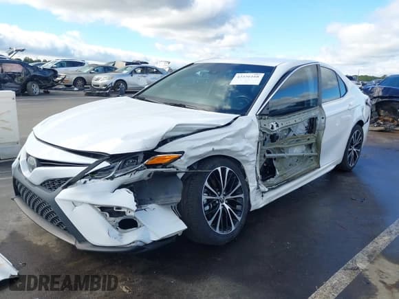 ✅ 2018 Toyota Camry XLE • VIN: 4T1B11HKXJU557537 • Лот: 43556168. Опубликован ранее на IAAI с пробегом 150 267 миль. Бесплатный доступ к архиву аукционных продаж из США и подробный отчёт об истории автомобиля на DreamBid. Изображение 2.