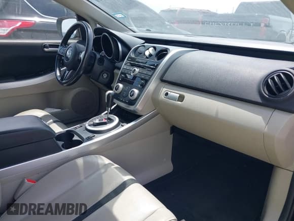 ✅ 2009 Mazda CX-7 Grand Touring • VIN: JM3ER293590219769 • Лот: 42080904. Опубликован ранее на IAAI с пробегом 174 863 миль. Бесплатный доступ к архиву аукционных продаж из США и подробный отчёт об истории автомобиля на DreamBid. Изображение 5.