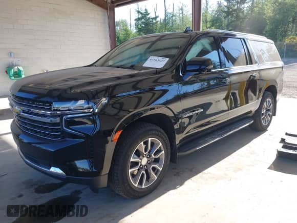 2024 Chevrolet Suburban LT z VIN 1GNSCCKD9RR336909, wystawiony jako IAAI lot #42363627 z przebiegiem 29 293 mil mil oraz . Historia ofert i sprzedaży dostępna na DreamBid. Obrazek 17.