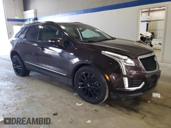 ✅ 2021 Cadillac XT5 AWD Sport • VIN: 1GYKNGRS5MZ165836 • Lot: 77872264. Listed on Copart with 46,065 mi. Free auction sales archive from the USA and detailed vehicle history report at DreamBid. Image 4.