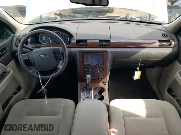 ✅ 2008 Ford Taurus SEL • VIN: 1FAHP24W98G126522 • Lot: 69154734. Wystawiony na Copart z przebiegiem Nie podano. Bezpłatny archiwum sprzedaży aukcyjnych z USA i szczegółowy raport historii pojazdu na DreamBid. Zdjęcie 8.