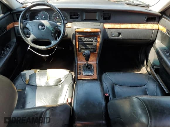 ✅ 2004 Kia Amanti • VIN: KNALD124145033425 • Lot: 54317155. Listed on Copart with 244,940 mi. Free auction sales archive from the USA and detailed vehicle history report at DreamBid. Image 8.