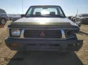 ✅ 1994 Mitsubishi Mighty Max • VIN: JA7LS21G4RP009588 • Лот: 60519834. Опубликован ранее на Copart с пробегом 123 918 миль. Бесплатный доступ к архиву аукционных продаж из США и подробный отчёт об истории автомобиля на DreamBid. Изображение 5.
