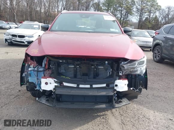 ✅ 2024 Mazda CX-5 Premium • VIN: JM3KFBDY2R0399811 • Lot: 41288881. Wystawiony na IAAI z przebiegiem 4 719 mil. Bezpłatny archiwum sprzedaży aukcyjnych z USA i szczegółowy raport historii pojazdu na DreamBid. Zdjęcie 12.