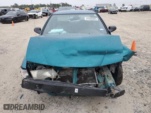 ✅ 1997 Nissan Sentra XE • VIN: 1N4AB41D0VC704704 • Лот: 41520885. Опубликован ранее на Copart с пробегом 140 811 миль. Бесплатный доступ к архиву аукционных продаж из США и подробный отчёт об истории автомобиля на DreamBid. Изображение 5.