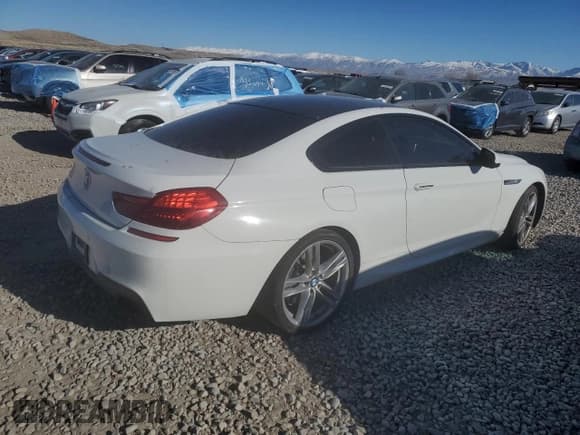 ✅ 2013 BMW 6 Series 650i • VIN: WBAYM9C57DDW20004 • Лот: 89395555. Опубликован ранее на Copart с пробегом Не указан. Бесплатный доступ к архиву аукционных продаж из США и подробный отчёт об истории автомобиля на DreamBid. Изображение 3.