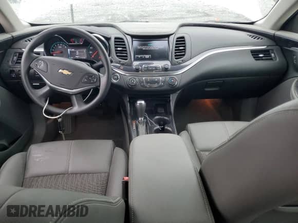 2018 Chevrolet Impala LS with VIN 2G11X5SA2J9166314, listed as a Copart auction lot 67401215 with 106,367 mi miles and Salvage title. Bid and sale history available at DreamBid. Image 8.