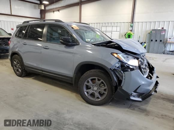 ✅ 2024 Honda Passport TrailSport • VIN: 5FNYF8H67RB005266 • Lot: 83092794. Listed on Copart with 5,504 mi. Free auction sales archive from the USA and detailed vehicle history report at DreamBid. Image 4.