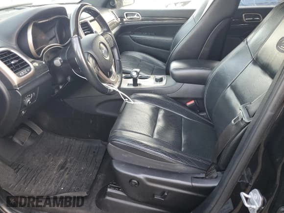 ✅ 2015 Jeep Grand Cherokee Overland • VIN: 1C4RJFCM7FC791589 • Lot: 77454564. Listed on Copart with 128,100 mi. Free auction sales archive from the USA and detailed vehicle history report at DreamBid. Image 7.