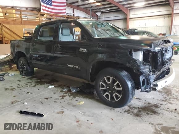 ✅ 2014 Toyota Tundra Limited • VIN: 5TFHW5F11EX396551 • Lot: 57665475. Listed on Copart with 21,860 mi. Free auction sales archive from the USA and detailed vehicle history report at DreamBid. Image 4.