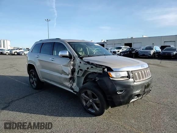 ✅ 2015 Jeep Grand Cherokee Overland • VIN: 1C4RJFCG7FC673181 • Lot: 46527875. Listed on Copart with 124,503 mi. Free auction sales archive from the USA and detailed vehicle history report at DreamBid. Image 11.