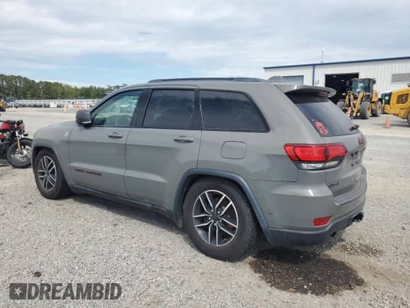 2020 Jeep Grand Cherokee Trailhawk с VIN 1C4RJFLG2LC303395, выставлен на аукционе Copart как лот 84279645 с пробегом 122 976 миль миль и Списание • Salvage title. История ставок и продаж доступна на DreamBid. Изображение 2.