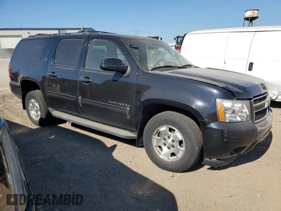 2013 Chevrolet Suburban LT with VIN 1GNSKJE79DR150003, listed as a Copart auction lot 80715615 with 164,810 mi miles and Salvage title. Bid and sale history available at DreamBid. Image 4.