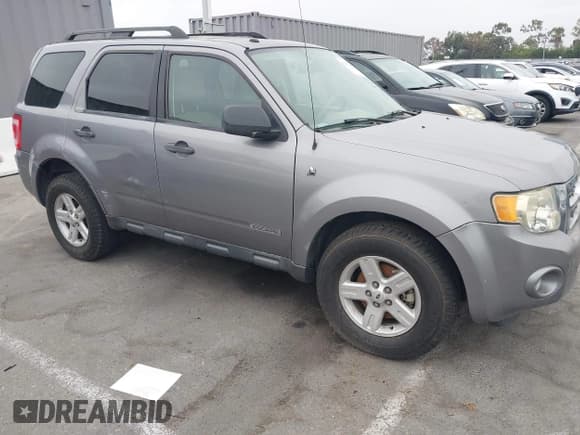 ✅ 2008 Ford Escape Hybrid • VIN: 1FMCU49H48KE78595 • Lot: 42972360. Listed on IAAI with 150,222 mi. Free auction sales archive from the USA and detailed vehicle history report at DreamBid. Image 1.