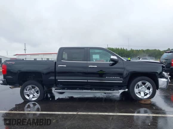 2017 Chevrolet Silverado 1500 LTZ with VIN 3GCUKSEC1HG419279, listed as a IAAI auction lot 43150941 with 240,491 mi miles and . Bid and sale history available at DreamBid. Image 13.