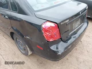 ✅ 2008 Suzuki Forenza • VIN: KL5JD56ZX8K845262 • Лот: 42141159. Опубликован ранее на IAAI с пробегом Не указан. Бесплатный доступ к архиву аукционных продаж из США и подробный отчёт об истории автомобиля на DreamBid. Изображение 6.