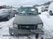 ✅ 2001 Ford Explorer Sport Trac • VIN: 1FMZU77E11UC98103 • Lot: 41311932. Wystawiony na IAAI z przebiegiem 196 408 mil. Bezpłatny archiwum sprzedaży aukcyjnych z USA i szczegółowy raport historii pojazdu na DreamBid. Zdjęcie 13.