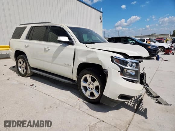 ✅ 2015 Chevrolet Tahoe LT • VIN: 1GNSCBKC8FR734187 • Lot: 82278185. Listed on Copart with 92,102 mi. Free auction sales archive from the USA and detailed vehicle history report at DreamBid. Image 4.