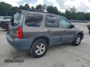✅ 2005 Mazda Tribute i • VIN: 4F2YZ02Z45KM64196 • Lot: 64272895. Listed on Copart with 158,256 mi. Free auction sales archive from the USA and detailed vehicle history report at DreamBid. Image 3.
