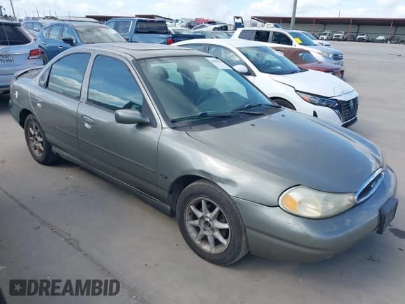 ✅ 1999 Ford Contour LX • VIN: 1FAFP66L9XK201636 • Лот: 42808815. Опубликован ранее на IAAI с пробегом 121 359 миль. Бесплатный доступ к архиву аукционных продаж из США и подробный отчёт об истории автомобиля на DreamBid. Изображение 1.