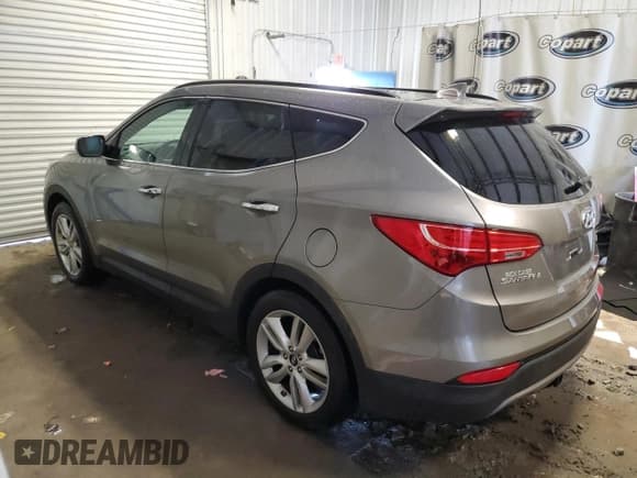 ✅ 2016 Hyundai Santa Fe • VIN: 5XYZW4LA2GG372073 • Лот: 39466403. Опубликован ранее на Copart с пробегом 98 803 миль. Бесплатный доступ к архиву аукционных продаж из США и подробный отчёт об истории автомобиля на DreamBid. Изображение 2.
