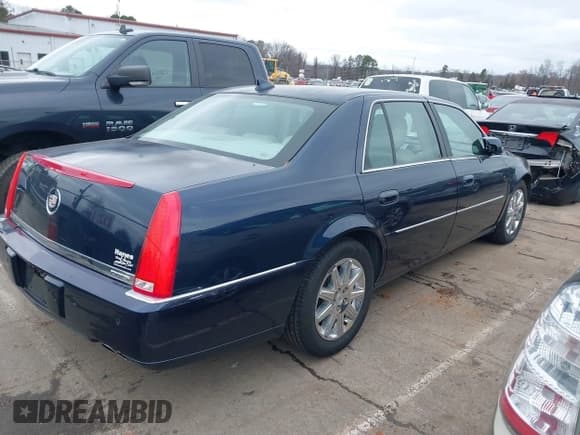 ✅ 2009 Cadillac DTS 1SA • VIN: 1G6KD57Y19U137656 • Лот: 41531439. Опубликован ранее на IAAI с пробегом 103 151 миль. Бесплатный доступ к архиву аукционных продаж из США и подробный отчёт об истории автомобиля на DreamBid. Изображение 4.
