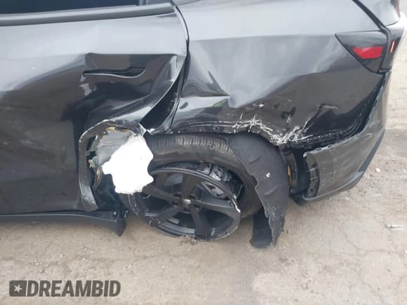 ✅ 2026 Tesla Model Y Long Range • VIN: 7SAYGDED4TF437624 • Lot: 43590088. Listed on IAAI with 1,167 mi. Free auction sales archive from the USA and detailed vehicle history report at DreamBid. Image 6.