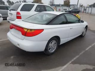 ✅ 2002 Saturn SC • VIN: 1G8ZY12732Z161127 • Лот: 43762261. Опубликован ранее на IAAI с пробегом 182 657 миль. Бесплатный доступ к архиву аукционных продаж из США и подробный отчёт об истории автомобиля на DreamBid. Изображение 4.