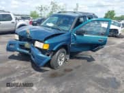 ✅ 1999 Isuzu Rodeo S • VIN: 4S2CK58W6X4332027 • Lot: 42087396. Listed on IAAI with 258,508 mi. Free auction sales archive from the USA and detailed vehicle history report at DreamBid. Image 2.