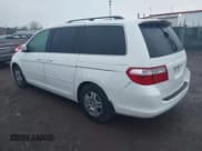 ✅ 2005 Honda Odyssey EX-L • VIN: 5FNRL38655B411556 • Lot: 43704042. Listed on IAAI with 205,713 mi. Free auction sales archive from the USA and detailed vehicle history report at DreamBid. Image 3.